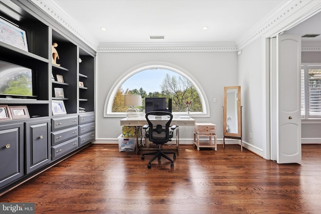 office space with visible vents, ornamental molding, and wood finished floors