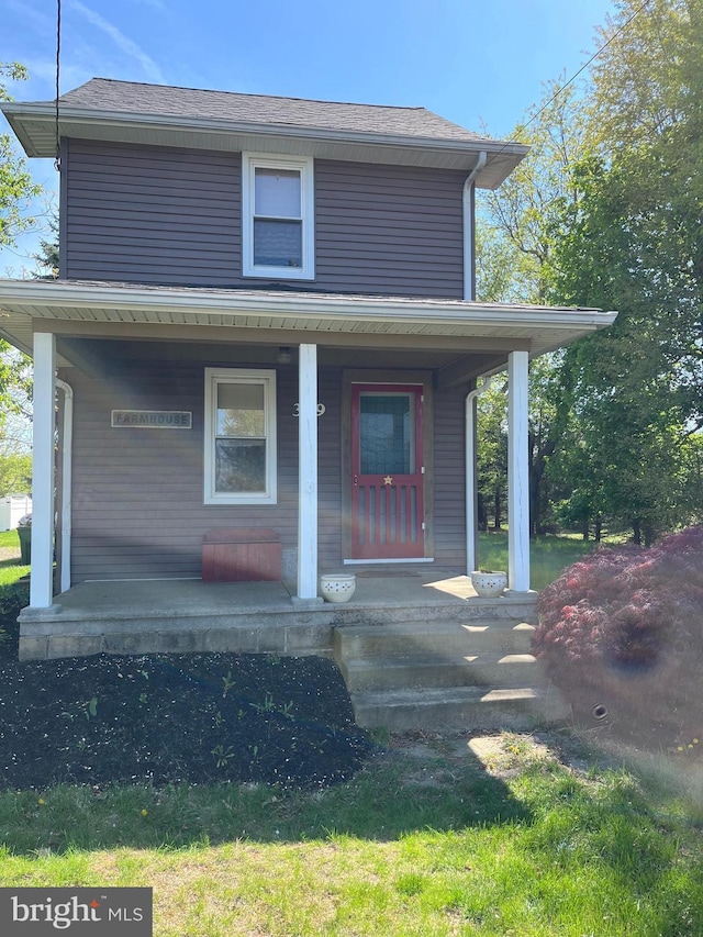view of front of home featuring covered porch