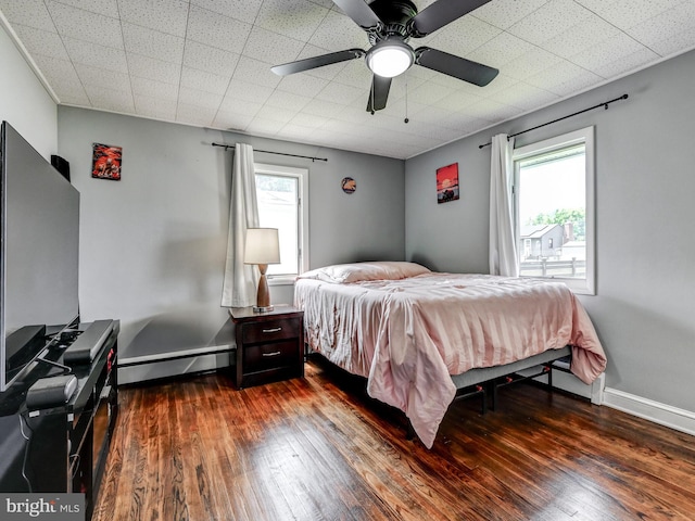724 Webb St, Aberdeen, MD 21001 - bedroom with a baseboard radiator, dark wood finished floors, and a ceiling fan