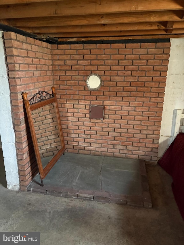 724 Webb St, Aberdeen, MD 21001 - detailed view of brick wall and unfinished concrete flooring