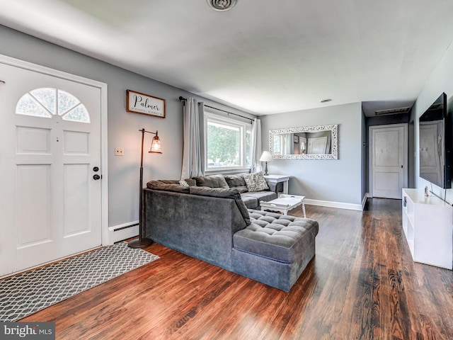724 Webb St, Aberdeen, MD 21001 - living area with wood finished floors and a baseboard heating unit