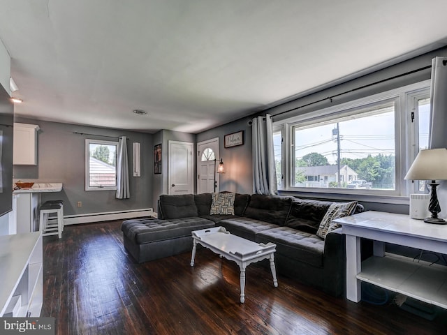 724 Webb St, Aberdeen, MD 21001 - living area featuring a baseboard radiator and dark wood-style flooring