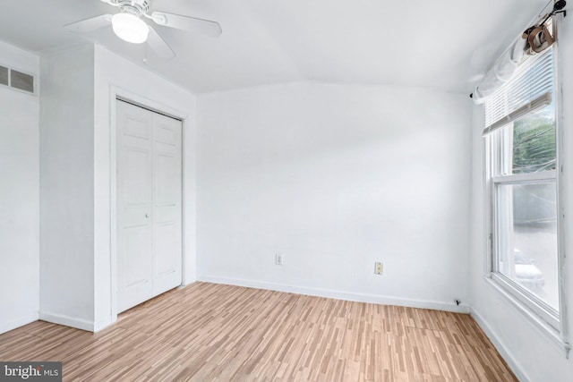 511 9th St, New Castle, DE 19720 - unfurnished bedroom featuring multiple windows, a closet, light wood-type flooring, and visible vents