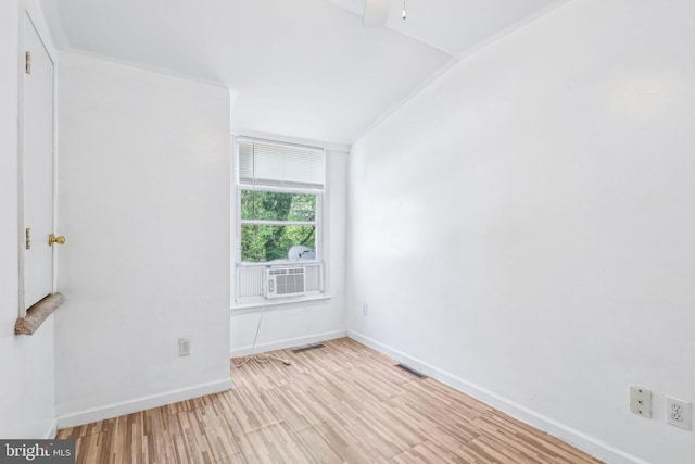 511 9th St, New Castle, DE 19720 - empty room featuring baseboards, cooling unit, visible vents, and wood finished floors