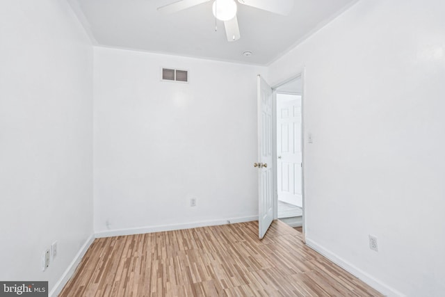 511 9th St, New Castle, DE 19720 - empty room featuring light wood finished floors, baseboards, ceiling fan, and visible vents