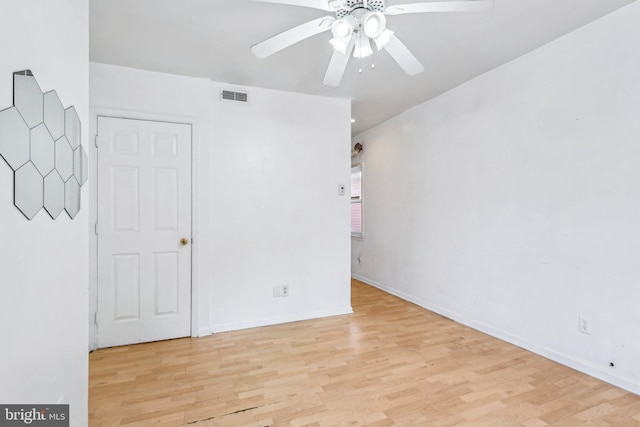 511 9th St, New Castle, DE 19720 - unfurnished bedroom with ceiling fan, baseboards, visible vents, and wood finished floors