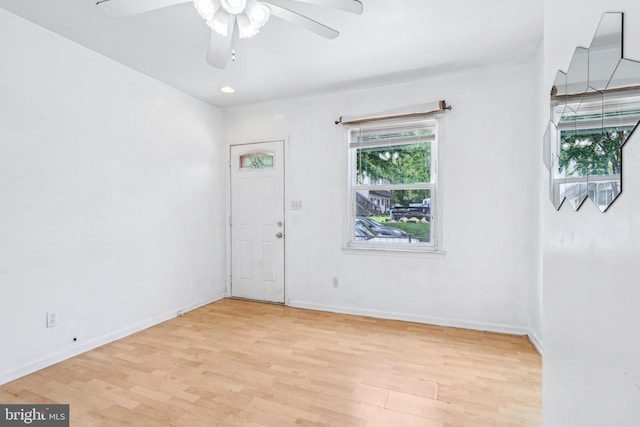 511 9th St, New Castle, DE 19720 - unfurnished room featuring light wood finished floors, baseboards, and ceiling fan
