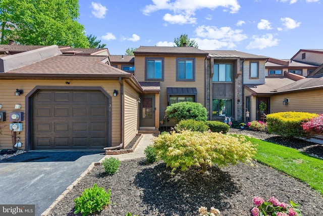 128 Granite Hill Ct, Langhorne, PA 19047 - prairie-style house with a garage and driveway