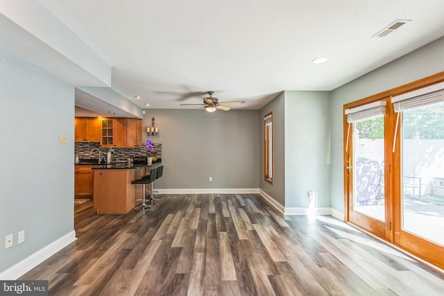 128 Granite Hill Ct, Langhorne, PA 19047 - living room with visible vents, dark wood-type flooring, baseboards, and ceiling fan