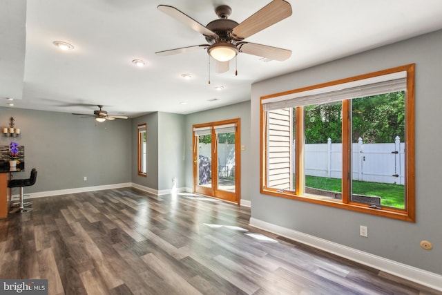 128 Granite Hill Ct, Langhorne, PA 19047 - unfurnished living room featuring baseboards, ceiling fan, and wood finished floors