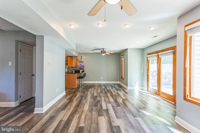 128 Granite Hill Ct, Langhorne, PA 19047 - unfurnished living room featuring baseboards, ceiling fan, visible vents, and wood finished floors