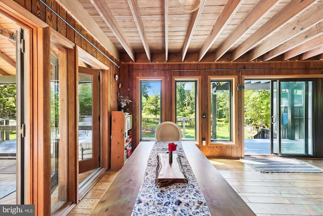 sunroom / solarium with beam ceiling