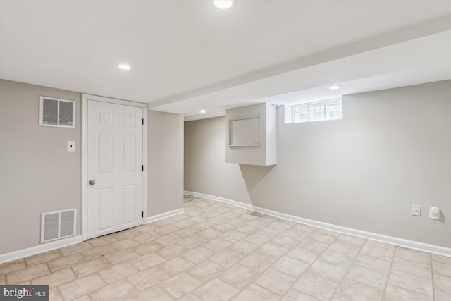 829 S Ivy St, Arlington, VA 22204 - basement with stone finish flooring, baseboards, visible vents, and recessed lighting