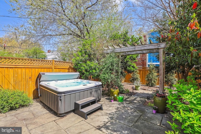 829 S Ivy St, Arlington, VA 22204 - view of patio with a hot tub and a fenced backyard