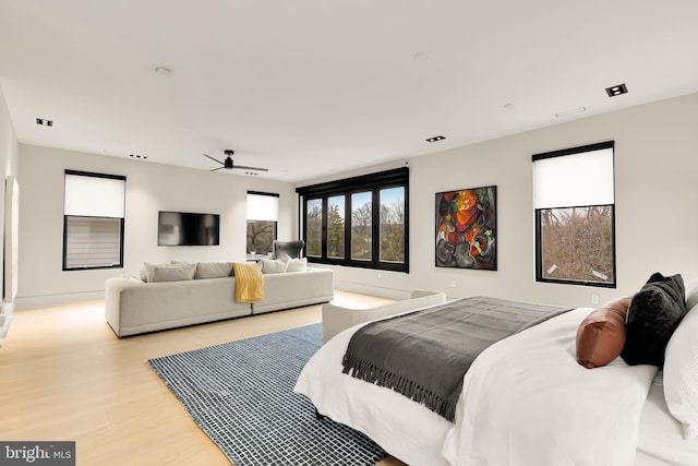 bedroom with wood finished floors
