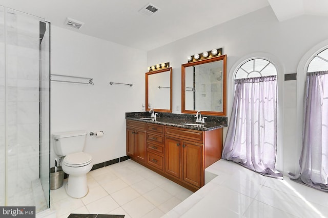 bathroom with a sink, tile patterned floors, and visible vents