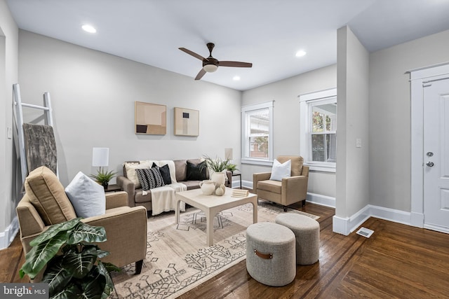 living room with visible vents, baseboards, recessed lighting, wood finished floors, and ceiling fan