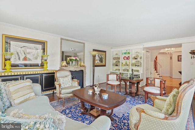 4200 Massachusetts Ave NW Unit 106, Washington, DC 20016 - living area featuring crown molding, stairway, a chandelier, wood finished floors, and built in features