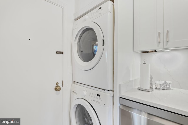 4200 Massachusetts Ave NW Unit 106, Washington, DC 20016 - washroom with stacked washing machine and dryer