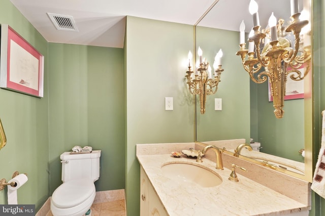 4200 Massachusetts Ave NW Unit 106, Washington, DC 20016 - half bath with toilet, vanity, tile patterned floors, and a chandelier