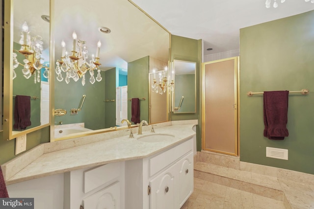 4200 Massachusetts Ave NW Unit 106, Washington, DC 20016 - full bathroom featuring a chandelier, vanity, and a shower stall