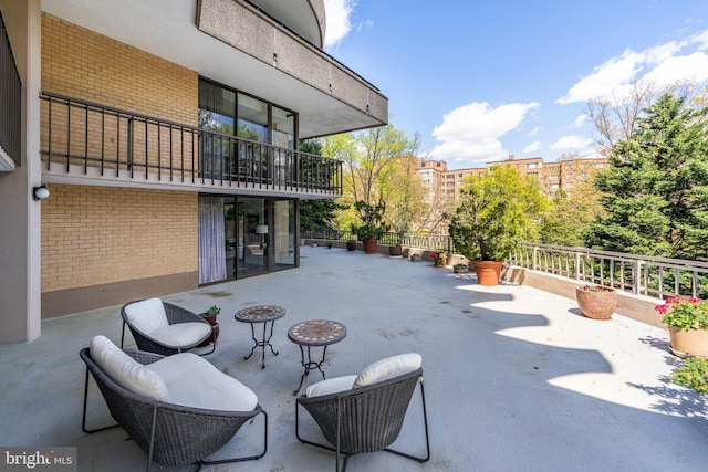 4200 Massachusetts Ave NW Unit 106, Washington, DC 20016 - view of patio featuring a balcony