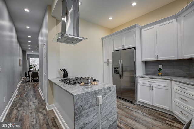 kitchen featuring stainless steel fridge with ice dispenser, island range hood, gas cooktop, dark wood finished floors, and recessed lighting