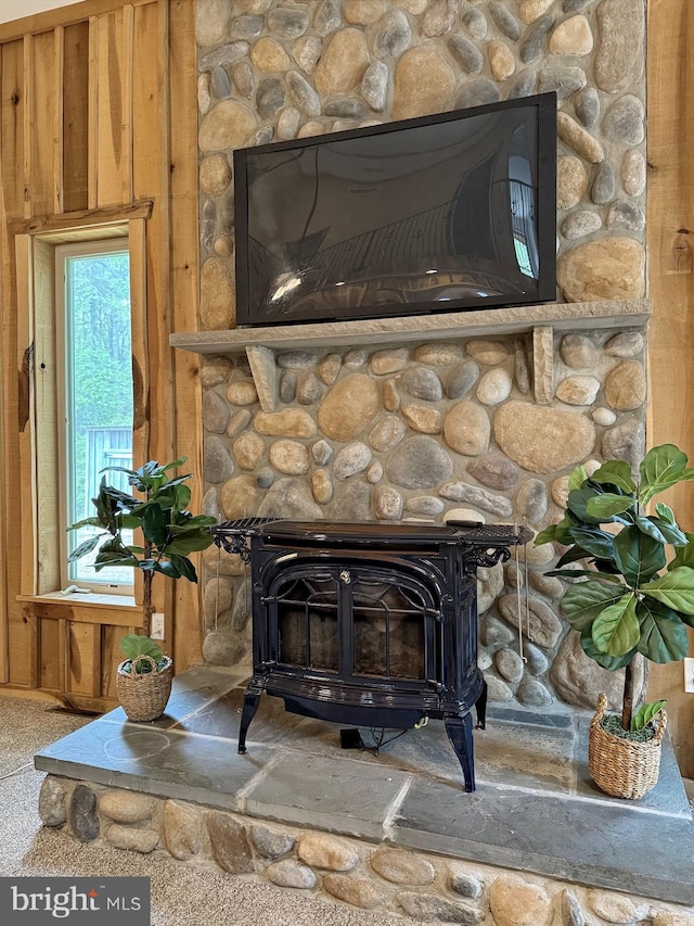 18855 Wicomico River Dr, Cobb Island, MD 20625 - details with wood walls and a wood stove