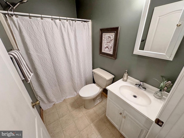 18855 Wicomico River Dr, Cobb Island, MD 20625 - bathroom with a shower with curtain, tile patterned floors, vanity, and toilet