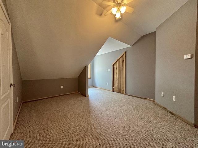 18855 Wicomico River Dr, Cobb Island, MD 20625 - bonus room featuring baseboards, vaulted ceiling, carpet flooring, and a ceiling fan