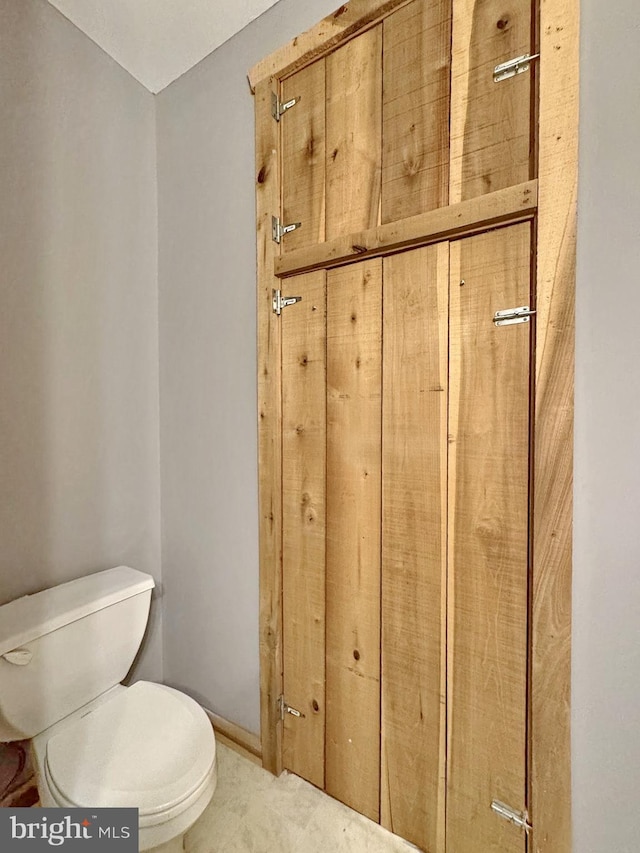 18855 Wicomico River Dr, Cobb Island, MD 20625 - bathroom featuring toilet and baseboards