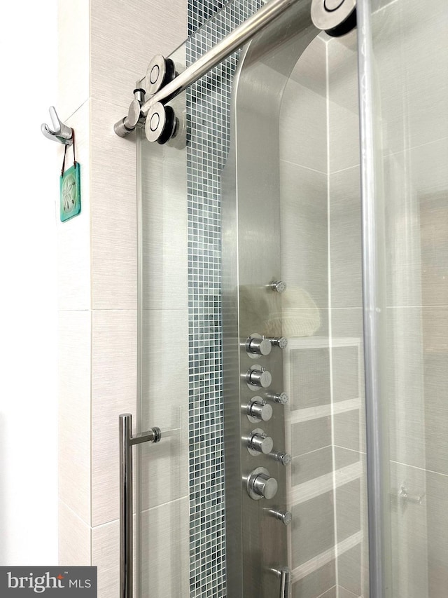 bathroom featuring a stall shower