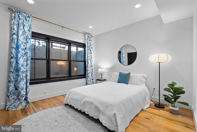1169 Neal St NE Unit 1, Washington, DC 20002 - bedroom featuring recessed lighting, baseboards, and wood finished floors