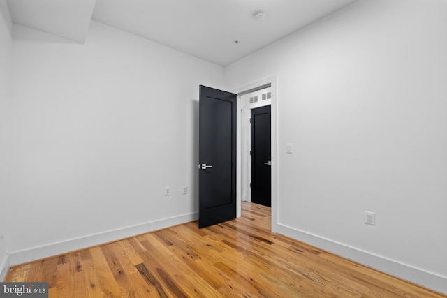 1169 Neal St NE Unit 1, Washington, DC 20002 - empty room with baseboards and light wood-style flooring
