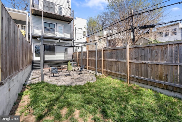 1169 Neal St NE Unit 1, Washington, DC 20002 - view of yard with fence private yard, a patio area, and entry steps