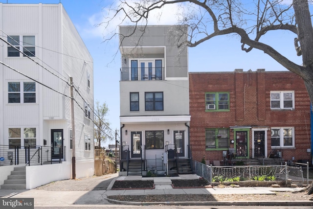 1169 Neal St NE Unit 1, Washington, DC 20002 - townhome / multi-family property featuring fence private yard and brick siding