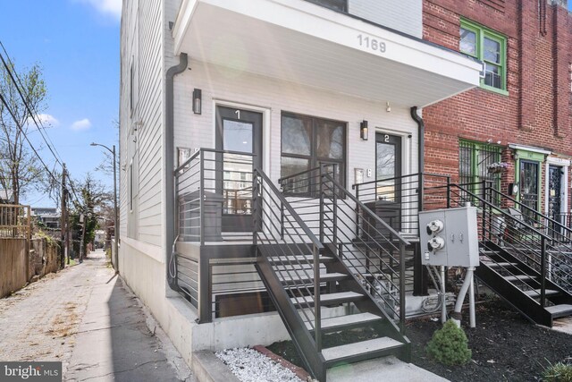1169 Neal St NE Unit 1, Washington, DC 20002 - property entrance featuring brick siding