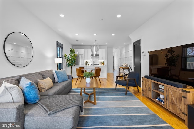 1169 Neal St NE Unit 1, Washington, DC 20002 - living area with recessed lighting and light wood-style flooring