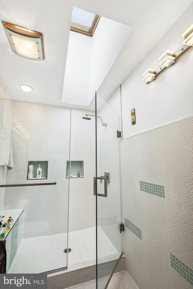 bathroom featuring a stall shower