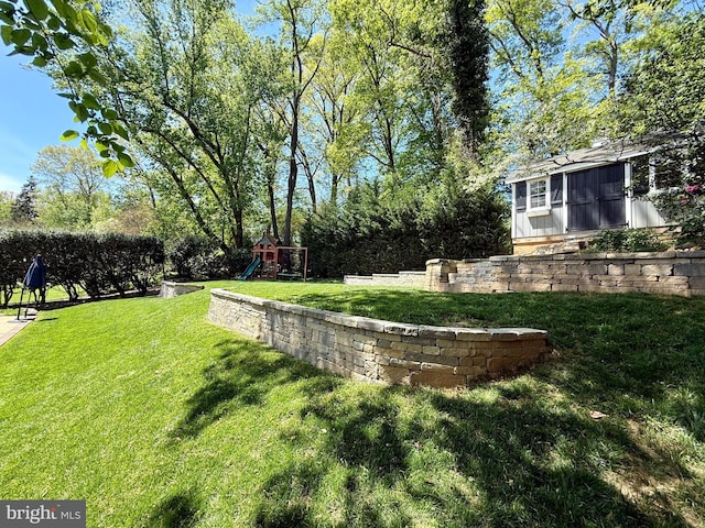 view of yard featuring a playground