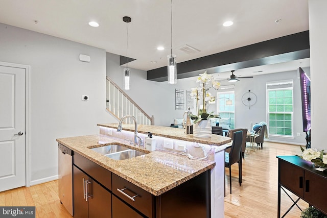 14184 Haro Trl, Gainesville, VA 20155 - kitchen with a sink, light wood-type flooring, pendant lighting, ceiling fan, and stainless steel dishwasher