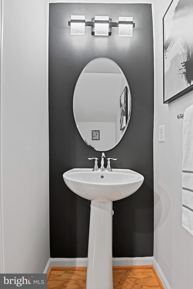 14184 Haro Trl, Gainesville, VA 20155 - bathroom featuring baseboards and wood finished floors
