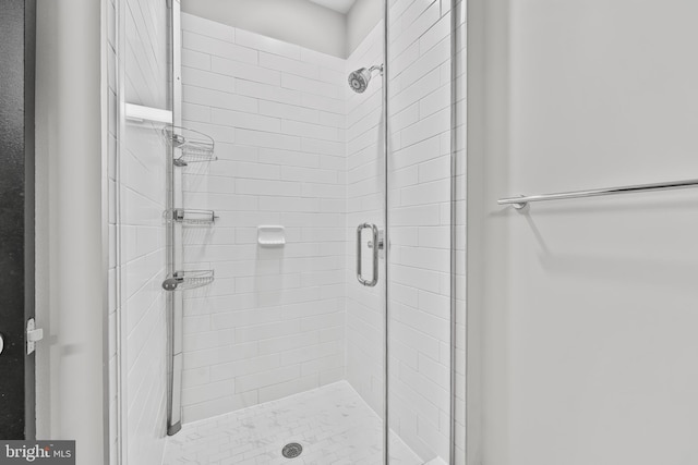 bathroom featuring a stall shower
