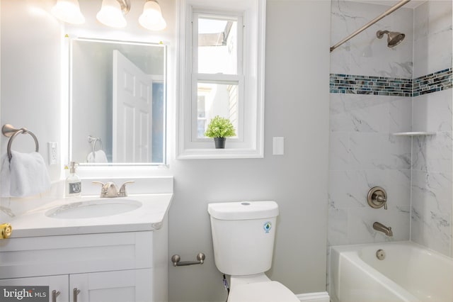 bathroom with shower / washtub combination, toilet, and vanity