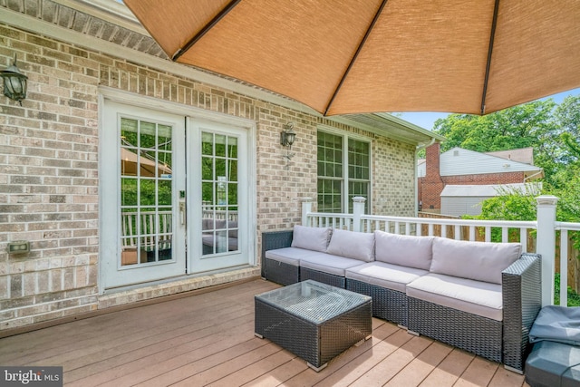 deck featuring an outdoor hangout area and french doors
