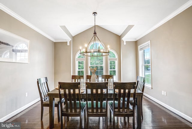 dining space with a chandelier, dark wood-type flooring, baseboards, lofted ceiling, and ornamental molding