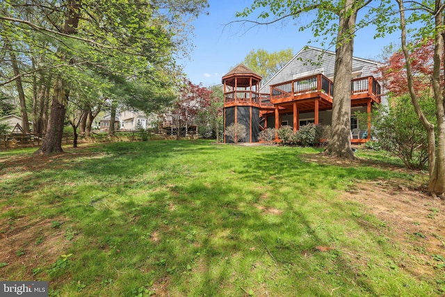 view of yard featuring a wooden deck