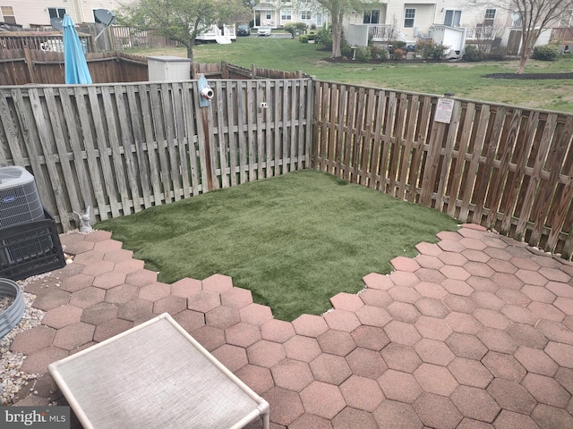341 Creekside Commons Ct, Stevensville, MD 21666 - fenced backyard featuring a residential view and central AC unit