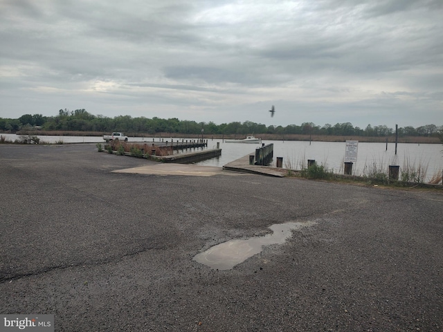 341 Creekside Commons Ct, Stevensville, MD 21666 - dock with a boat ramp and a water view