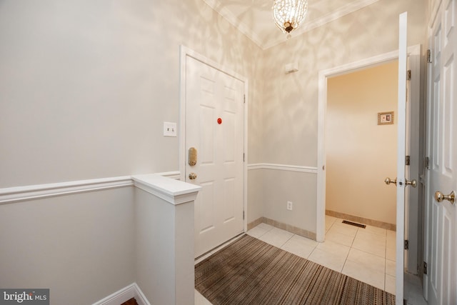 110 Mulberry Ct, Morgantown, PA 19543 - foyer entrance featuring ornamental molding, light tile patterned floors, and a chandelier